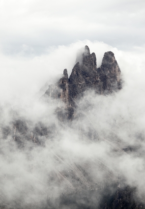 Mountain Peak Surrounded By Clouds